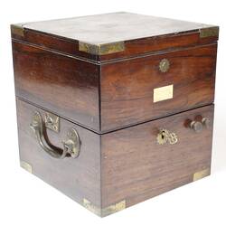 Rectangular wooden box, three quarter view.
