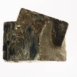 Yellow, brassy mineral with a metallic lustre.