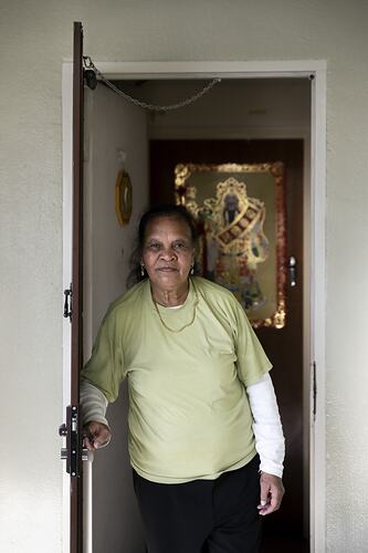 Public Housing Resident Ana Martins Stands at her Doorway During the COVID-19 Pandemic, Richmond, Victoria, 18 May 2020