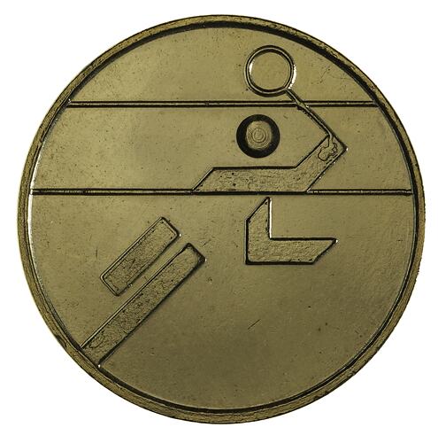 Round gilt medal with badminton logo from Brisbane Commonwealth Games.