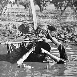 Negative - Two Boys with Sailing Tub 'Capsized' in a Muddy Hole, Merrigum, Victoria, 1910