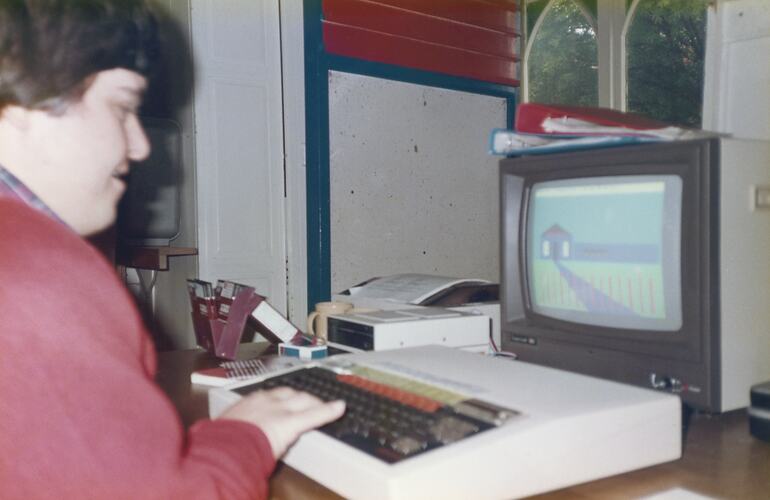 Young person working on a computer.