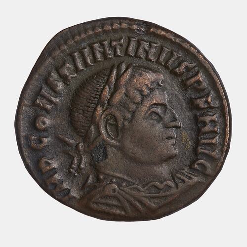 Roughly round coin. Wreathed bust of man facing right. Text above and around.