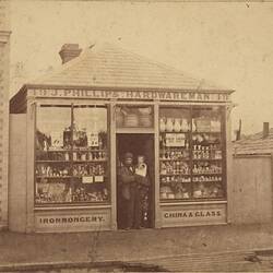 Digital Photograph - Owner & Baby Daughter outside J Phillips Hardware Store, Abbotsford, 1858