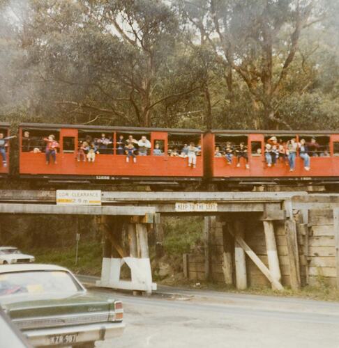Digital Photograph - Families Hanging out Windows of 'Puffing Billy' steam train, on Wooden Bridge, Selby, 1979