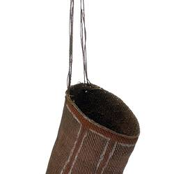 Twined conical pandanus basket (shown hanging)