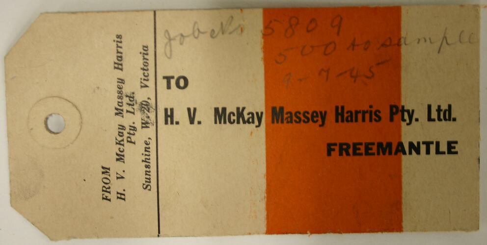 Cardboard tag printed on both sides with orange and black ink. Some handwritten pencil text.