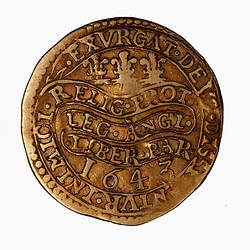 Coin, round, at centre within a beaded circle, three plumes; below on a continuous scroll text in three lines.