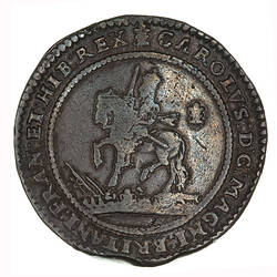 Coin, round, within a circle of beads, crowned King wearing armour and a long scarf, holding sword upright.