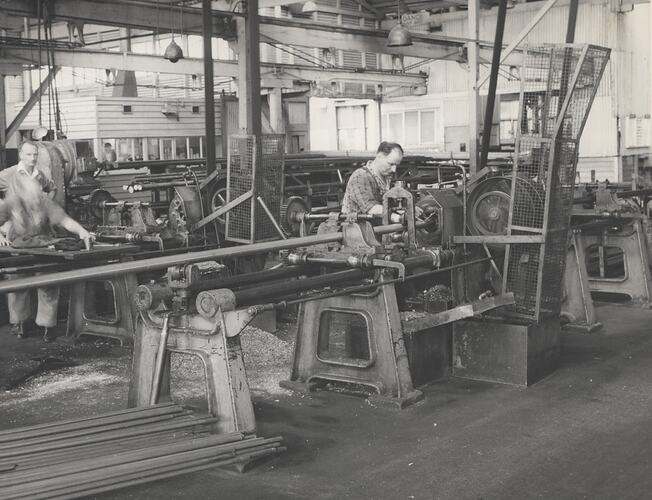 Men working in the bright steel shafting shop.