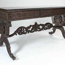 Elaborately carved wooden table of Indian origin