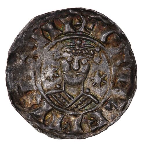 Irregular coin with bust of crowned male facing. Stars either side, text around.