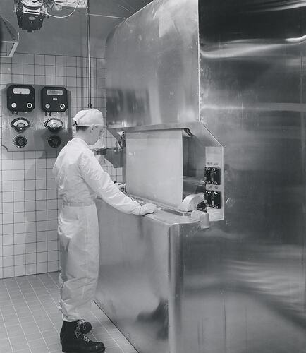 Photograph - Kodak Australasia Pty Ltd, Worker Monitoring Film Base Receiving a Coating of Emulsion, Kodak Factory, Coburg, circa 1965