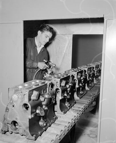 Worker in Spray Painting Engines in Motor Vehicle Factory, Victoria, 1954-1955