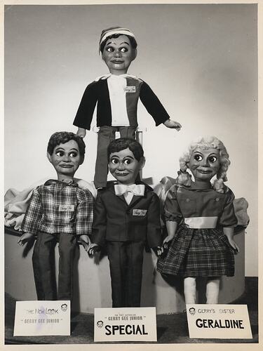 Three male and one female doll.