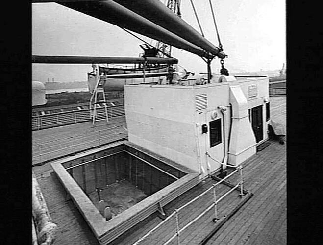Ship deck with empty small square swimming pool.