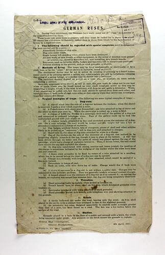 Single page form on off-white paper with printed text, cross marks and stains on page.