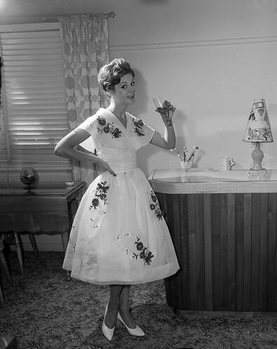 Woman in the Savoy Plaza Hotel, Melbourne, Victoria, Mar 1960