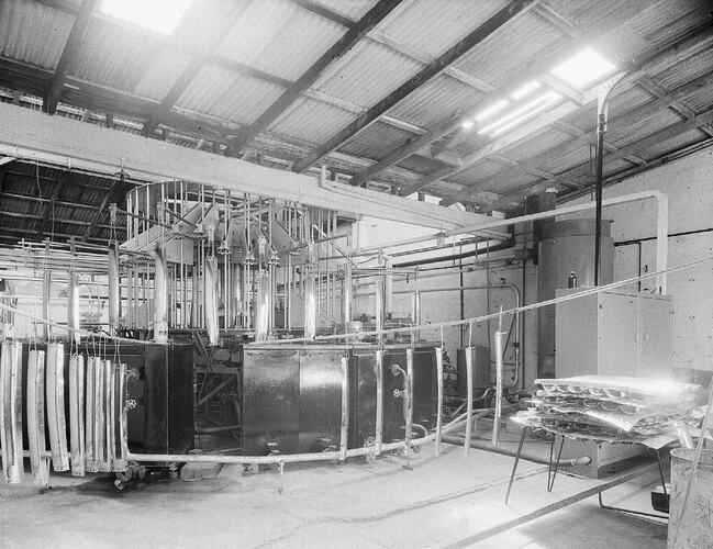 Monochrome photograph of a machinery.