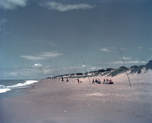 Colour transparency of a crowd on a beach.