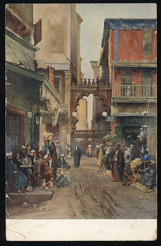 Colour postcard of a street scene.