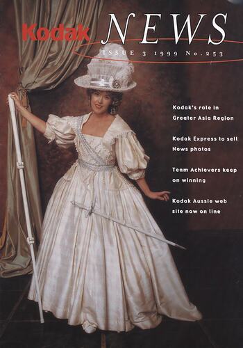 Magazine cover featuring woman in 18th century costume.