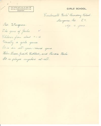 Handwritten game description in green and blue ink on paper