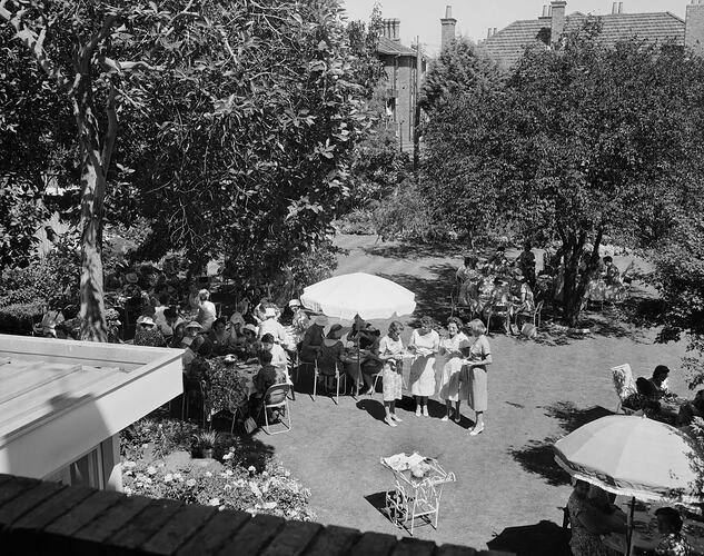 Women Eating in a Garden, Toorak, Victoria, 02 Mar 1960