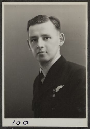 Studio portrait of man in military uniform.