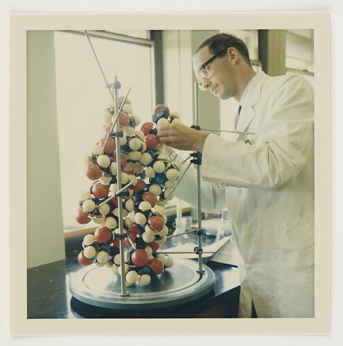 Slide 323, 'Extra Prints of Coburg Lecture', Chemist With Gelatine Molecule Model, Kodak Factory, Coburg, circa 1960s