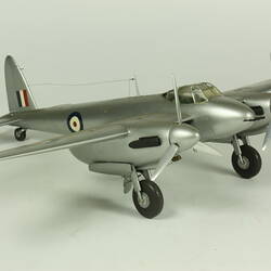 Silver model aeroplane.