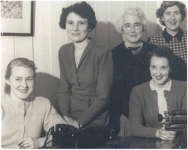 Black and white photograph of a female group.