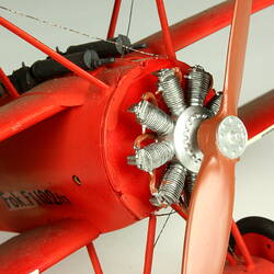 Red aeroplane model. Propeller detail.