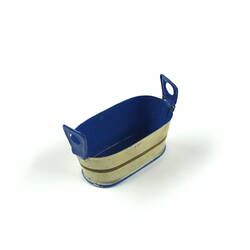 Cream toy metal tub.