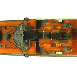 Naval ship with two masts, overhead view.