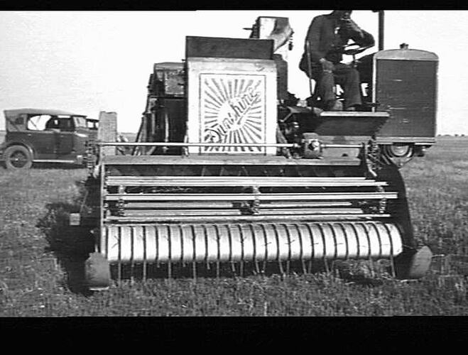 AUTO HEADER WITH PICKUP ATTACHMENT WORKING AT BROADMEADOWS