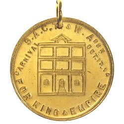 Medal with three square up and across building, text around.