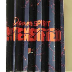Concertina-style folded blue placard with red details and printing.