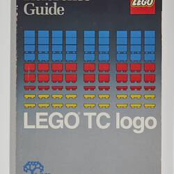 Front cover with rows of separate Lego pieces in blue, red and yellow. Text above and below.