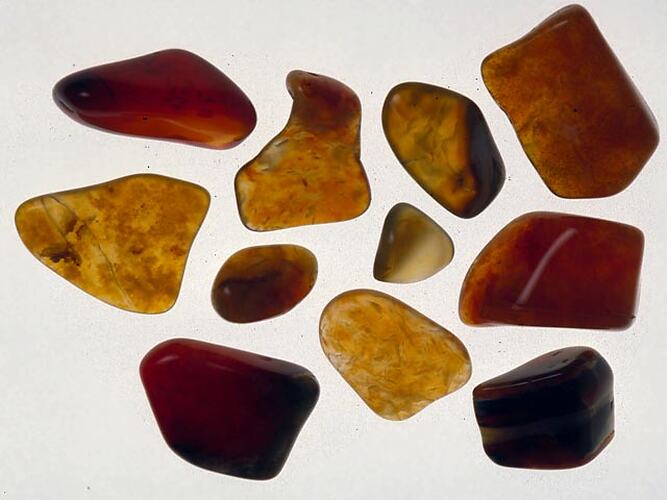Angular amber-coloured agate pieces.