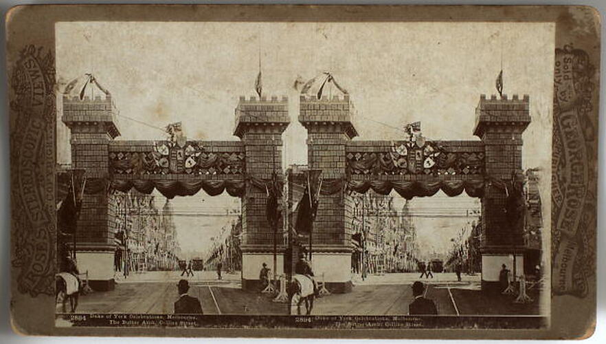 Double image of arch with turrets and flying flags. In centre, six shields. Tram on the street.