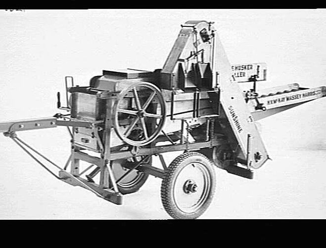 MAIZE HUSKER & SHELLER FITTED WITH POLE. NOV 1946