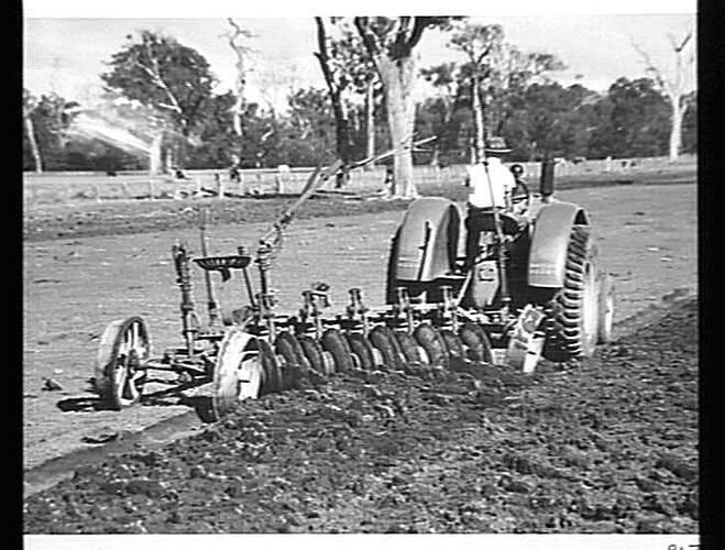 10 DISC `SUNDERCUT' STUMP JUMP DISC CULTIVATING PLOUGH AT WORK ON MR. W. MCLARTY'S FARM, PINJARRA, W.A.