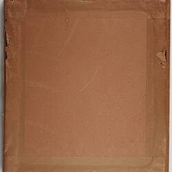 Back of framed picture. Brown paper covering.
