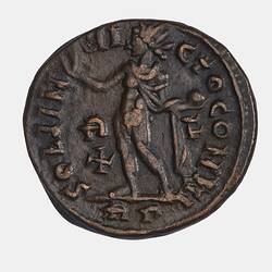 Roughly round coin. Standing figure with cloak holds globe in right hand. Text around.
