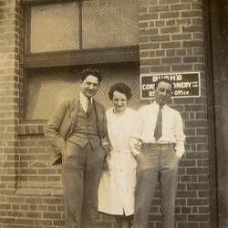Digital Photograph - Two Men & One Woman outside Bush's Confectionery Factory, Richmond, circa 1935