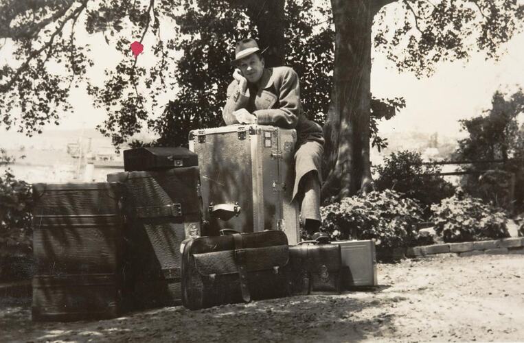 Digital Photograph - Man Leaning on Luggage Trunk, Awaiting Detention as Enemy Alien, 1939