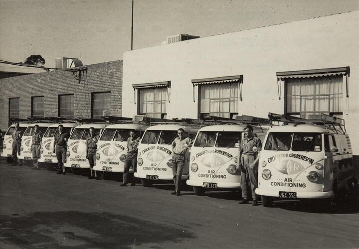 Digital Photograph - Seven Men & Seven 'Kombi' Volkswagon Vans Lined Up for Stocktake Day, Crockford and Robertson Air Conditioning, Fairfield, 1968