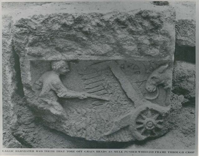 A sculpture on a tombstone.