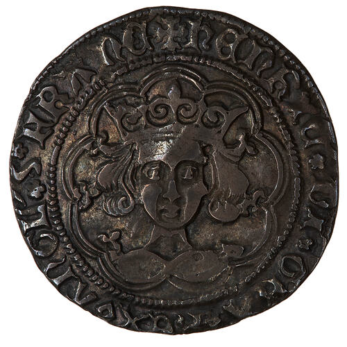 Coin, round, crowned bust of the King facing within a tressure of nine arches; text around.